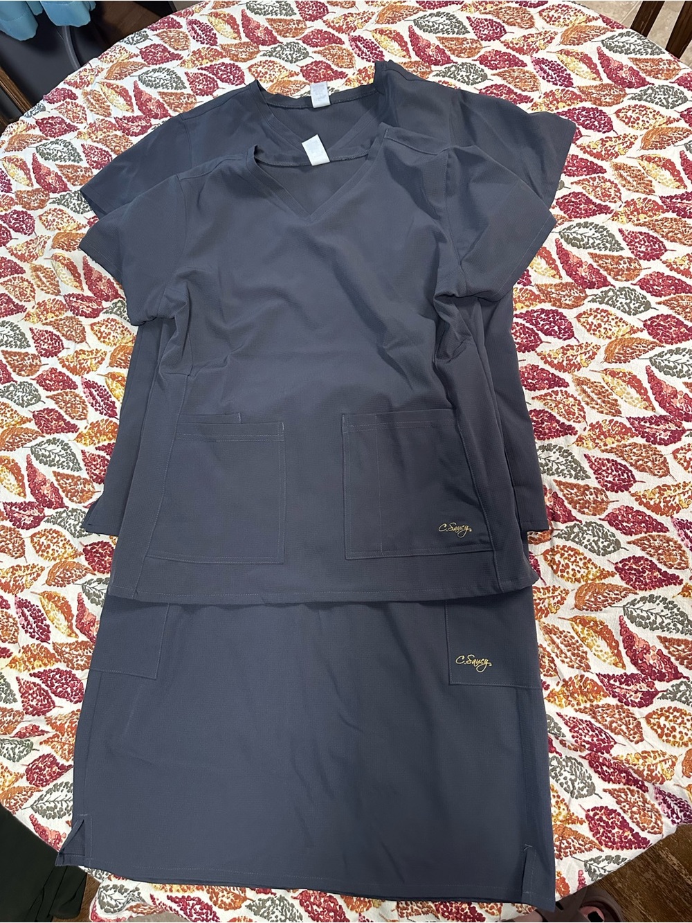 Gray scrub set. M and L top, L skirt.